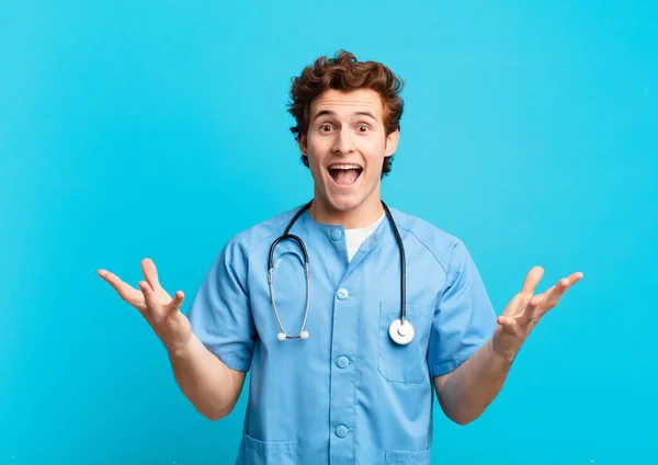 Young Nurse Man Feeling Happy Excited Surprised Shocked Smiling Astonished — Stock Photo, Image