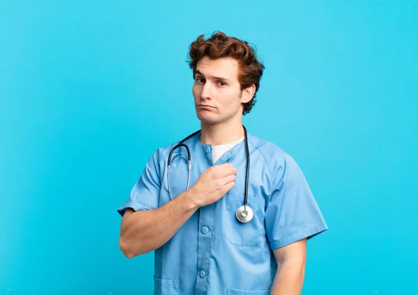 Young Nurse Man Looking Arrogant Successful Positive Proud Pointing Self — Stock Photo, Image