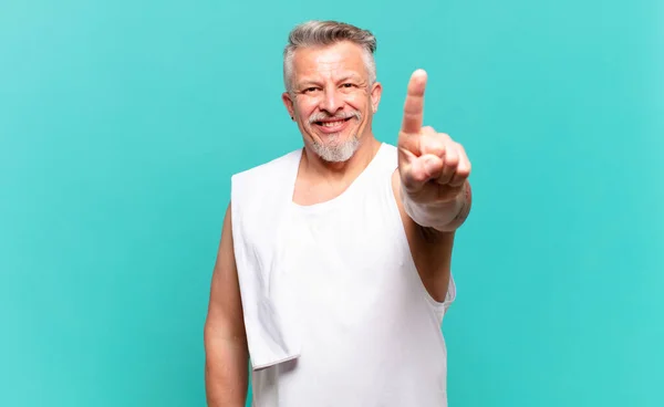 Senior Athlete Man Smiling Proudly Confidently Making Number One Pose — Stock Photo, Image