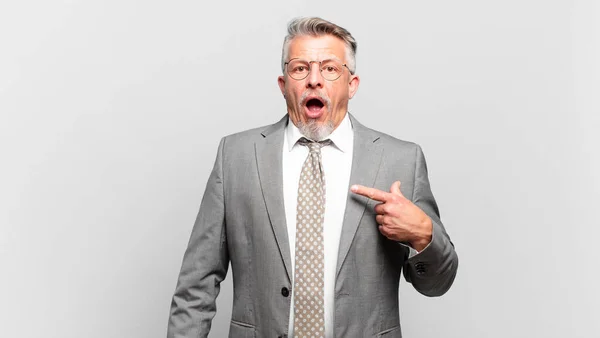 Senior Businessman Looking Shocked Surprised Mouth Wide Open Pointing Self — Stock Photo, Image