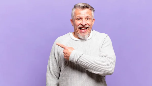 Old Senior Man Looking Excited Surprised Pointing Side Upwards Copy — Fotografia de Stock