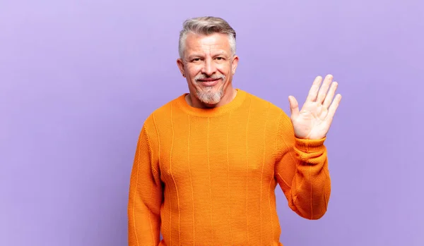 Old Senior Man Smiling Happily Cheerfully Waving Hand Welcoming Greeting — Fotografia de Stock