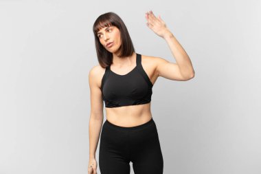 athlete woman feeling stressed, anxious, tired and frustrated, pulling shirt neck, looking frustrated with problem