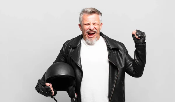 Senior Motorbike Rider Shouting Aggressively Angry Expression Fists Clenched Celebrating — Stock Photo, Image