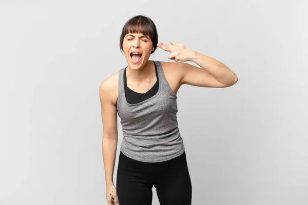 Athlete Woman Looking Unhappy Stressed Suicide Gesture Making Gun Sign — Stock Photo, Image
