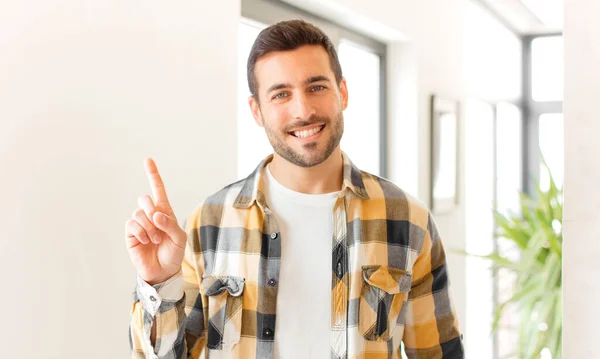 Handsome Man Smiling Looking Friendly Showing Number One First Hand — Stock Photo, Image