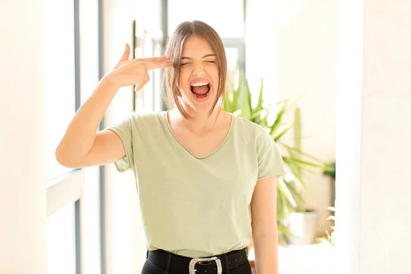 Pretty Woman Looking Unhappy Stressed Suicide Gesture Making Gun Sign — Stock Photo, Image