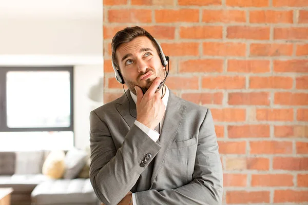 Handsome Telemarketer Thinking Feeling Doubtful Confused Different Options Wondering Which — Stock Photo, Image