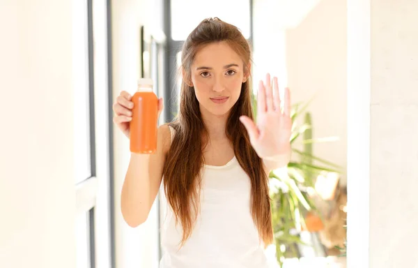 Pretty Woman Looking Serious Stern Displeased Angry Showing Open Palm — Stock Photo, Image