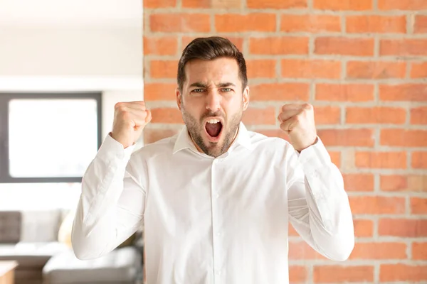 Handsome Businessman Shouting Aggressively Angry Expression Fists Clenched Celebrating Success — Stock Photo, Image