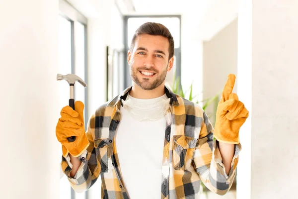 Handyman Smiling Looking Friendly Showing Number One First Hand Forward — Stock Photo, Image