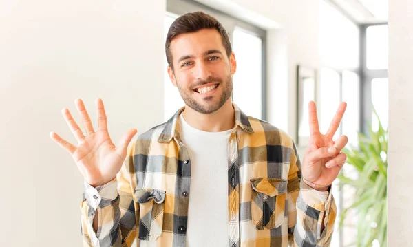 Handsome Man Smiling Looking Friendly Showing Number Seven Seventh Hand — Stock Photo, Image