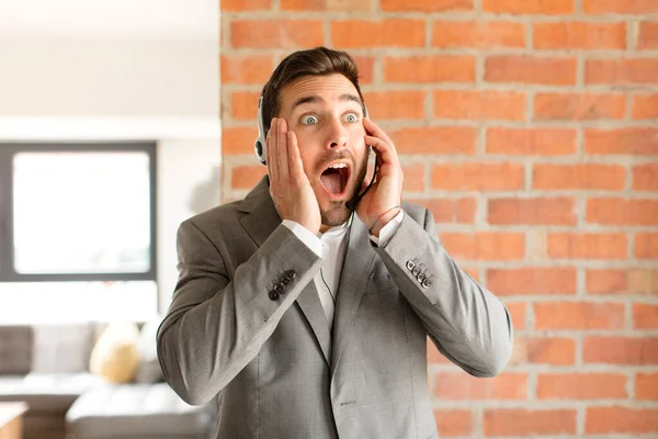 Handsome Telemarketer Feeling Happy Excited Surprised Looking Side Both Hands — Stock Photo, Image