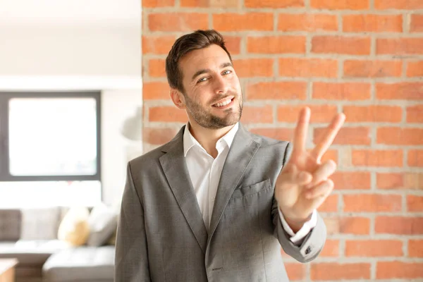 Handsome Businessman Smiling Looking Happy Carefree Positive Gesturing Victory Peace — Stock Photo, Image