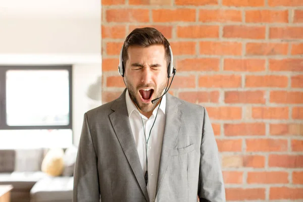 Handsome Telemarketer Shouting Aggressively Looking Very Angry Frustrated Outraged Annoyed — Stock Photo, Image