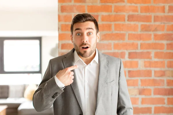 Handsome Businessman Looking Shocked Surprised Mouth Wide Open Pointing Self — Stock Photo, Image