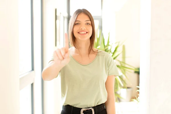 Pretty Woman Smiling Proudly Confidently Making Number One Pose Triumphantly — Stock Photo, Image
