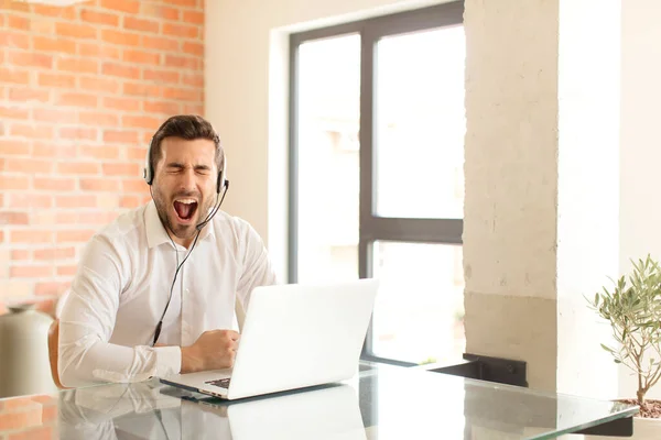 Handsome Telemarketer Shouting Aggressively Looking Very Angry Frustrated Outraged Annoyed — Stock Photo, Image