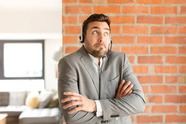 Handsome Telemarketer Shrugging Feeling Confused Uncertain Doubting Arms Crossed Puzzled — Stock Photo, Image