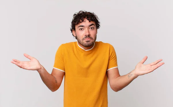 Hispanic Handsome Man Feeling Puzzled Confused Doubting Weighting Choosing Different — Stock Photo, Image