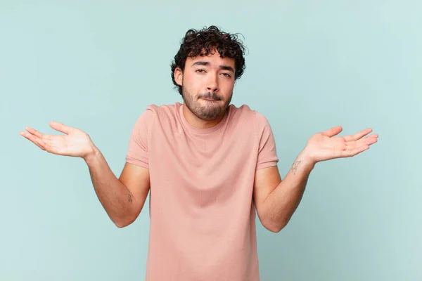 Hispanic Handsome Man Feeling Puzzled Confused Doubting Weighting Choosing Different — Stock Photo, Image