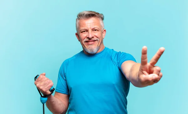 Senior Handsome Man Practising Fitness Wearing Sport Clothes — Stock Fotó