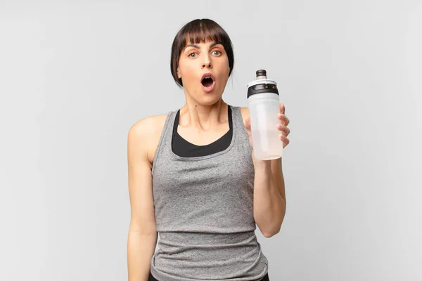 Young Fitness Woman Water Can —  Fotos de Stock