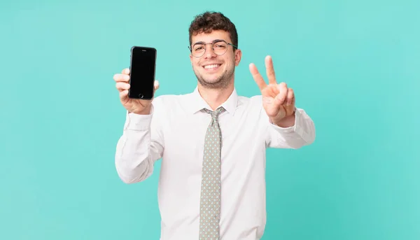 Business Smartphone Smiling Looking Happy Carefree Positive Gesturing Victory Peace — Stock Photo, Image