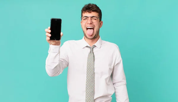Business Smartphone Cheerful Carefree Rebellious Attitude Joking Sticking Tongue Out — Stock Photo, Image
