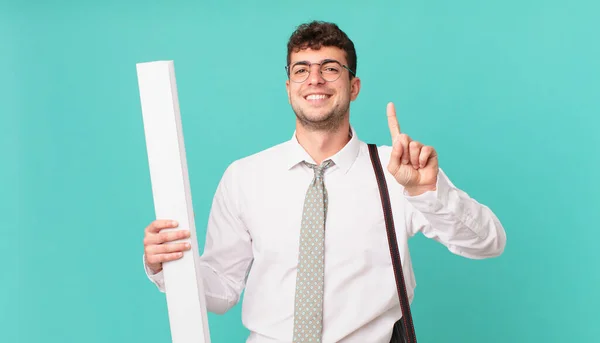 Arquitecto Sonriendo Buscando Amigable Mostrando Número Uno Primero Con Mano —  Fotos de Stock