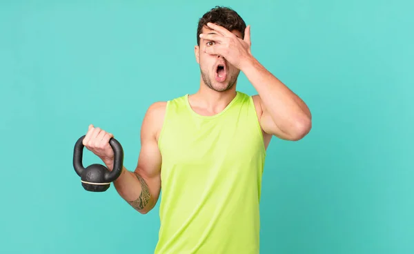 Fitness Man Looking Shocked Scared Terrified Covering Face Hand Peeking — Stock Photo, Image