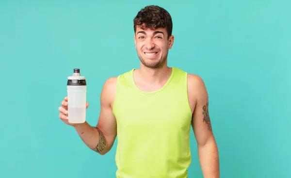 Homem Fitness Olhando Confuso Confuso Mordendo Lábio Com Gesto Nervoso — Fotografia de Stock