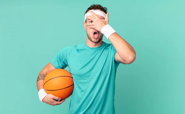 Fitness Man Looking Shocked Scared Terrified Covering Face Hand Peeking — Stock Photo, Image