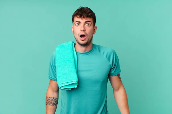 Fitness Man Looking Very Shocked Surprised Staring Open Mouth Saying — Stock Photo, Image