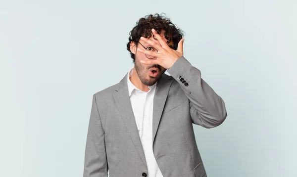 Hispanic Businessman Looking Shocked Scared Terrified Covering Face Hand Peeking — Zdjęcie stockowe