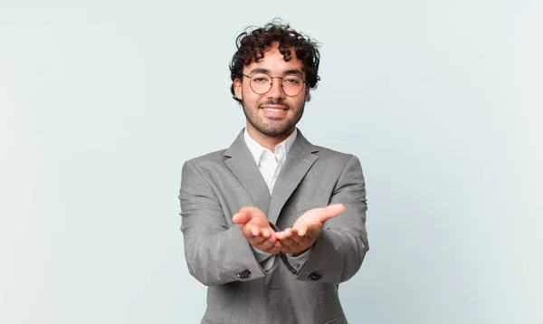 Hispanic Businessman Smiling Happily Friendly Confident Positive Look Offering Showing — Zdjęcie stockowe