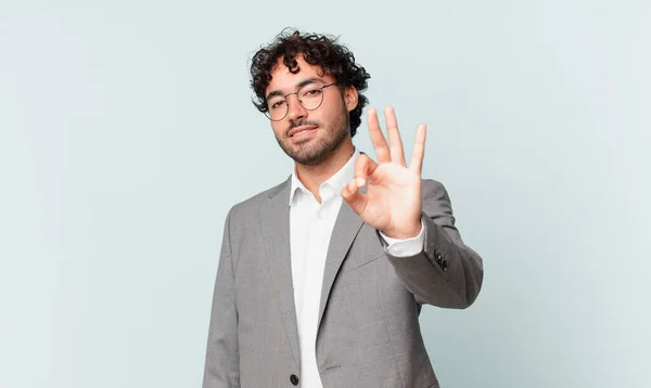 Hispanic Businessman Smiling Looking Friendly Showing Number Three Third Hand — Zdjęcie stockowe