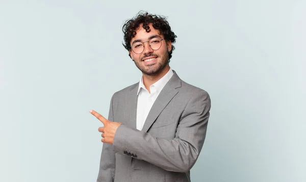 Hispanic Businessman Looking Excited Surprised Pointing Side Upwards Copy Space — Foto Stock