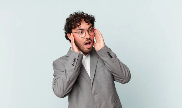 Hispanic Businessman Feeling Happy Excited Surprised Looking Side Both Hands — Zdjęcie stockowe