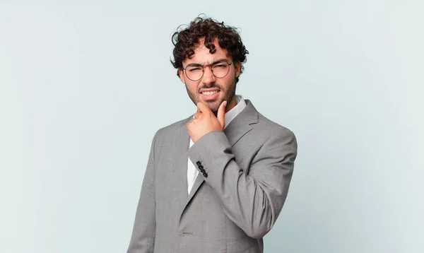 Hispanic Businessman Mouth Eyes Wide Open Hand Chin Feeling Unpleasantly — Stockfoto