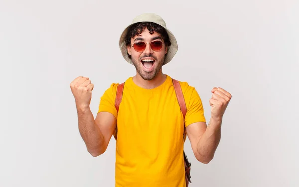 Hispanic Tourist Man Feeling Shocked Excited Happy Laughing Celebrating Success — Stock Photo, Image