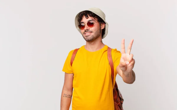 Hispanic Tourist Man Smiling Looking Friendly Showing Number Two Second — Stock Photo, Image