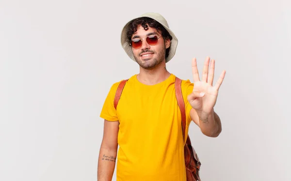 Hispanic Tourist Man Smiling Looking Friendly Showing Number Four Fourth — Stock Photo, Image