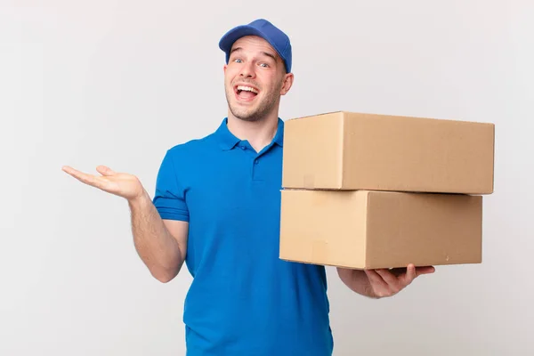 Package Deliver Man Feeling Happy Excited Surprised Shocked Smiling Astonished — Stock Photo, Image