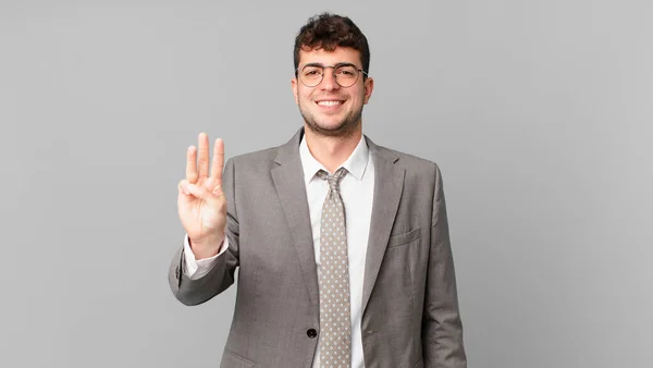 Empresário Sorrindo Olhando Amigável Mostrando Número Três Terceiro Com Mão — Fotografia de Stock