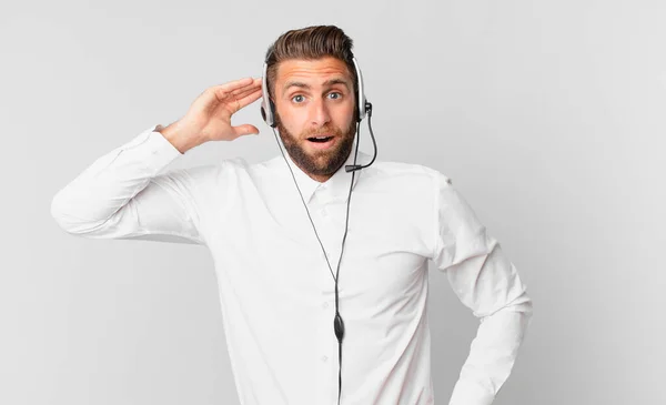 Young Handsome Man Looking Happy Astonished Surprised Telemarketing Concept — Φωτογραφία Αρχείου