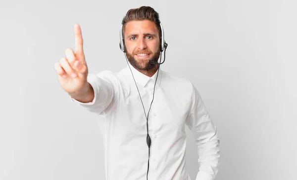Young Handsome Man Smiling Looking Friendly Showing Number One Telemarketing — Stock Photo, Image