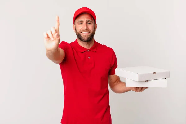 Young Handsome Man Smiling Proudly Confidently Making Number One Pizza — Stockfoto