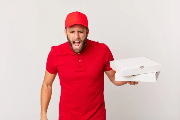 Young Handsome Man Shouting Aggressively Looking Very Angry Pizza Delivering — Stok fotoğraf