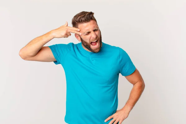 Young Handsome Man Looking Unhappy Stressed Suicide Gesture Making Gun — Stockfoto